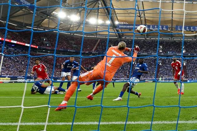 (260906) -- GELSENKIRCHEN, Sept. 6, 2026 -- Goalkeeper of FC Schalke 04 Loris Karius (C) makes a save during the German first division Bundesliga football match between FC Schalke 04 and FC Bayern Munich in Gelsenkirchen, Germany, Sept. 5, 2026. (Photo by Xinhua) (SP)GERMANY-GELSENKIRCHEN-FOOTBALL-BUNDESLIGA-SCHALKE 04 VS BAYERN MUNICH JoachimxBywaletz 