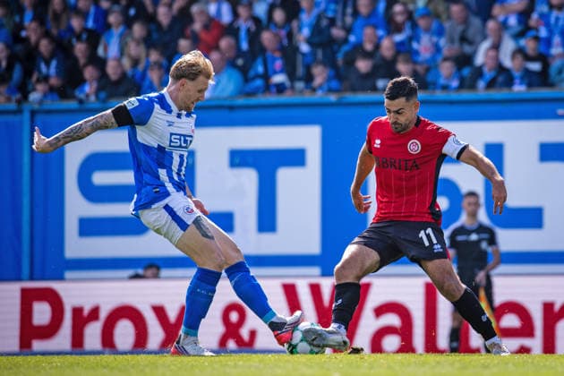 Soccer, 3rd Division: Hansa Rostock vs. SV Wehen Wiesbaden, September 5, 2026. Andreas Voglsammer (Hansa), Tarik Gözüsirin (SVWW),