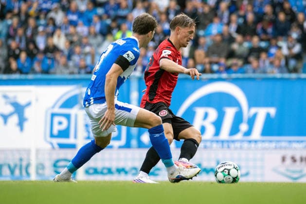 Soccer, 3rd Division: Hansa Rostock vs. SV Wehen Wiesbaden, September 5, 2005, Florian Bohnert (Hansa), Fabian Greilinger (SVWW),