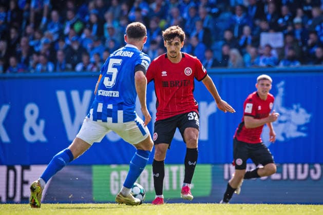 Soccer, 3rd Division: Hansa Rostock vs. SV Wehen Wiesbaden, September 5, 2005, Marco Schuster (Hansa), Raul Paula (SVWW),