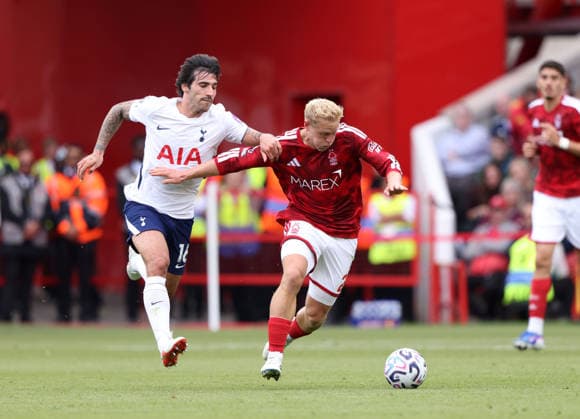 Sandro Tonali (TH) Xaver Schlager (NF) at the Nottingham Forest v Tottenham Hotspur, EPL match, at The City Ground, Nottingham, Notts., on 5th September, 2026.  .