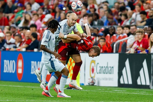 Toronto FC v Chicago Fire Andrew Gutman 15 of Chicago Fire FC competes for the ball against Toronto FC players during a Major League Soccer game at BMO Field in Toronto, Ontario, Canada, on September 5, 2026. Toronto Ontario Canada  Copyright: xIndrawanxKumalax originalFilename:kumala-majorlea260905_npn00.jpg