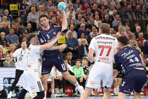 September 5, 2026, xBHAx, Handball, Opel HBL, 2026–2027 Season, 1st HBL, SG Flensburg Handewitt vs. HC Erlangen, GGW Arena: Niclas Kirkelökke (SG Flensburg Handewitt, No. 5) on the attack against Yannik Bialowa (HC Erlangen, No. 7) on the right, Maciej Gebala (HC Erlangen, No. 77), and Aymeric Minne (SG Flensburg Handewitt, No. 44). Schleswig-Holstein, Germany