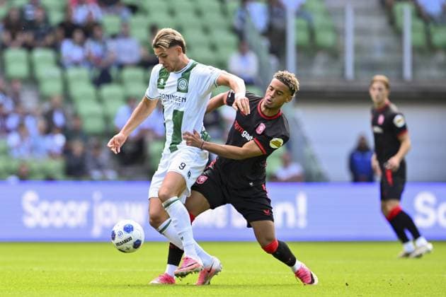 GRONINGEN - (lr) Brynjolfur Willumsson of FC Groningen and Daouda Weidmann of FC Twente during the Dutch Eredivisie match between FC Groningen and FC Twente at the Euroborg stadium on 6 September 2026 in Groningen, the Netherlands. COR LASKER ANP Eredivisie 2026 27 xVIxANPxSportx xxANPxIVx 567359302 originalFilename: 567359302.jpg