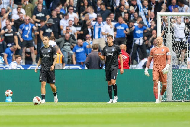 06.09.2026, xtgx, Fussball - 2.Bundesliga Hertha BSC Berlin - 1.FC Magdeburg emspor, v.l. Magdeburg enttaeuscht, schaut enttaeuscht, niedergeschlagen, disappointed, Tobias Mueller (Magdeburg, 5), Falko Michel (Magdeburg, 21), Dominik Reimann (Magdeburg, 1) (DFL DFB REGULATIONS PROHIBIT ANY USE OF PHOTOGRAPHS as IMAGE SEQUENCES and or QUASI-VIDEO) Berlin *** September 6, 2026, xtgx, Soccer 2. Bundesliga Hertha BSC Berlin 1 FC Magdeburg emspor, from left: Magdeburg disappointed, looking disappointed, dejected, Tobias Mueller Magdeburg, 5, Falko Michel Magdeburg, 21, Dominik Reimann (Magdeburg), 1. DFL and DFB regulations prohibit any use of photographs as image sequences and or quasi-video. Berlin