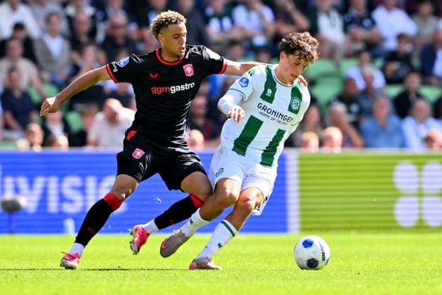 GRONINGEN - (lr) Daouda Weidman of FC Twente, Thom van Bergen of FC Groningen during the Dutch Eredivisie match between FC Groningen and FC Twente at the Euroborg stadium on September 6, 2026 in Groningen, the Netherlands. COR LASKER ANP Eredivisie 2026 27 xVIxANPxSportx xxANPxIVx 567369088 originalFilename: 567369088.jpg