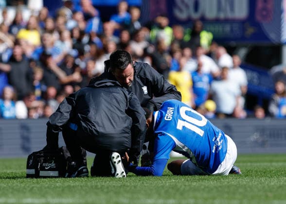 Birmingham, England, 6th September 2026. Demarai Gray of Birmingham City goes down with an injury during the Birmingham City vs Wolverhampton Wanderers Sky Bet Championship match at St Andrews, Birmingham. Picture credit should read: Cody Froggatt Sportimage EDITORIAL USE ONLY. No use with unauthorised audio, video, data, fixture lists, club league logos or live services. Online in-match use limited to 120 images, no video emulation. No use in betting, games or single club league player publications. SPI_040_CF_BIRMINGHAM_V_WOLVES SPI-4976-0040