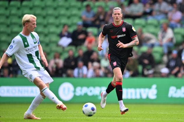 GRONINGEN - (lr) Thijmen Blokzijl of FC Groningen, Wout Weghorst of FC Twente during the Dutch Eredivisie match between FC Groningen and FC Twente at the Euroborg stadium on September 6, 2026 in Groningen, the Netherlands. COR LASKER ANP Eredivisie 2026 27 xVIxANPxSportx xxANPxIVx 567369639 originalFilename: 567369639.jpg