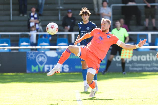 September 6, 2026, Soccer, Men s, Regionalliga Nord, Matchday 7, Bremer SV vs. BSV Kickers Emden; Peer Mahncke (orange, No. 5) of BSV Kickers Emden in a tackle with Luca Schlake (No. 8) of Bremer SV