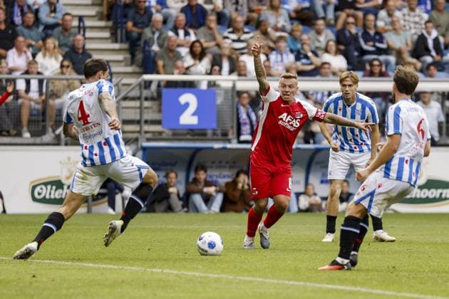 HEERENVEEN - (lr) Sam Kersten of SC Heerenveen, Jordy Clasie of AZ Alkmaar, Ringo Meerveld of SC Heerenveen and Dirk Proper of SC Heerenveen during the Dutch Eredivisie match between SC Heerenveen and AZ Alkmaar at the Abe Lenstra Stadium on 6 September 2026 in Heerenveen, the Netherlands. VINCENT JANNINK ANP 2026 27 2026 27 xVIxANPxSportx xxANPxIVx 567372958 originalFilename: 567372958.jpg