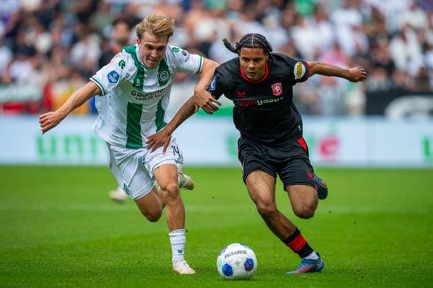 GRONINGEN , 06-09 2026 , Stadium Euroborg , season 2026 2027 , Dutch Eredivisie football , match between FC Groningen and FC Twente , picture shows Fc Groningen player Jorg Schreuders FC Twente player Filip Thorvaldsen Groningen - Twente  x206581813x Copyright: