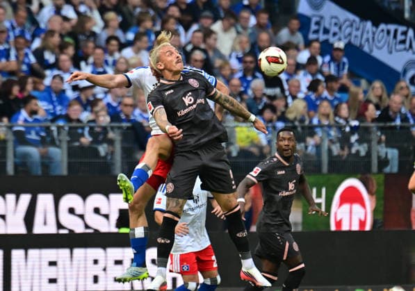 06.09.2026,GER Fußball, Männer, 1.BL, Spieltag 2, Saison 2026 2027, Hamburg, Hamburger SV vs 1.FSV Mainz 05 Sebastian Bornauw (HSV 33) versucht sich gegen Phillip Tietz (Mainz 05 09) durchzusetzen DFB DFL regulations prohibit any use of photographs as image sequences and or quasi-video) Hamburg Volksparkstadion Hamburg Deutschland *** September 6, 2026, German Soccer, Men, 1st Division, Matchday 2, 2026–2027 Season, Hamburg, Hamburger SV vs. 1. FSV Mainz 05; Sebastian Bornauw (HSV 33) tries to get past Phillip Tietz (Mainz 05 09). DFB and DFL regulations prohibit any use of photographs as image sequences and or quasi-video. Hamburg Volksparkstadion, Hamburg, Germany Copyright: xnordphotoxGmbH xWitkex