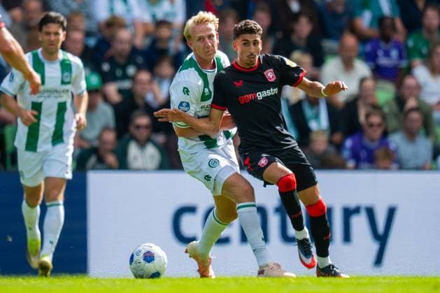 GRONINGEN , 06-09 2026 , Stadium Euroborg , season 2026 2027 , Dutch Eredivisie football , match between FC Groningen and FC Twente , picture shows FC Groningen player Thijmen Blokzijl FC Twente player Younes Taha Groningen - Twente  x206583896x Copyright:
