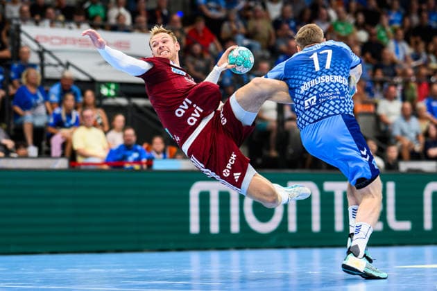 TVB Stuttgart vs. Füchse Berlin, Handball 1 Bundesliga, Men s, 2026–2027 Season, TVB Stuttgart vs. Füchse Berlin, Porsche Arena: Berlin s Mathias Gidsel in action against Stuttgart s Samuel Röthlisberger, Stuttgart, Porsche Arena, Baden-Württemberg, Germany