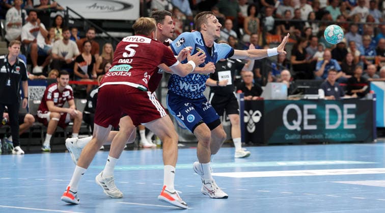 September 6, 2026, Germany, Stuttgart, Handball: TVB Stuttgart vs. Füchse Berlin; from left: Max Darj (Berlin), Simone Mengon (TVB)