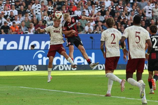 Tor zum 1:0 per Kopf durch Jonathan Burkhardt, Jonathan Michael ãJonnyÒ Burkardt, Jonny Burkardt (Eintracht Frankfurt , Nr. 9) gegen Hennes Behrens (FC Augsburg, 16), Eintracht Frankfurt - FC Augsburg, Bundesliga, BL, Saison 2026 2027, 2. Spiel, 06.09.2026, Frankfurt Deutsche Bank Park Deutschland *** Goal to make it 1–0, scored with a header by Jonathan Burkhardt, Jonathan Michael Jonny Burkardt, Jonny Burkardt (Eintracht Frankfurt), No. 9, against Hennes Behrens (FC Augsburg), 16, Eintracht Frankfurt vs. FC Augsburg, Bundesliga, BL, 2026–2027 season, Match 2, September 6, 2026, Frankfurt, Deutsche Bank Park, Germany