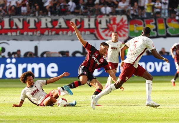 06.09.2026, xovx, Fußball Fußball Bundesliga, Eintracht Frankfurt - FC Augsburg v.l. Han-Noah Massengo (FC Augsburg), Younes Ebnoutalib (Eintracht Frankfurt), Chrislain Matsima (FC Augsburg) (DFL DFB REGULATIONS PROHIBIT ANY USE OF PHOTOGRAPHS as IMAGE SEQUENCES and or QUASI-VIDEO) emspor Frankfurt *** September 6, 2026, xovx, Soccer, Bundesliga, Eintracht Frankfurt vs. FC Augsburg: Han Noah Massengo (FC Augsburg), Younes Ebnoutalib (Eintracht Frankfurt), Chrislain Matsima (FC Augsburg). DFL and DFB regulations prohibit any use of photographs as image sequences and or quasi-video. Eintracht Frankfurt