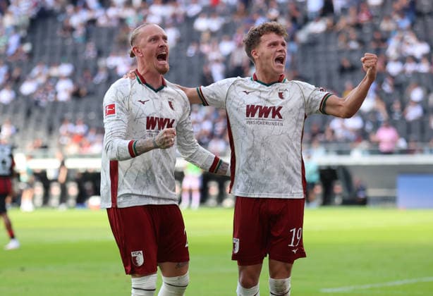 06.09.2026, Fussball Bundesliga, Eintracht Frankfurt - FC Augsburg, v.l., Torjubel zum 1:2 durch Robin Fellhauer (FC Augsburg), Goal celebration, celebrate the goal, Marius Wolf (FC Augsburg) DFL DFB REGULATIONS PROHIBIT ANY USE OF PHOTOGRAPHS AS IMAGE SEQUENCES AND OR QUASI-VIDEO. xdcx *** September 6, 2026, Bundesliga, Eintracht Frankfurt vs. FC Augsburg, from left, Robin Fellhauer (FC Augsburg) celebrating the 1-2 goal, goal celebration, celebrating the goal, Marius Wolf, FC Augsburg. DFL and DFB regulations prohibit any use of photographs as image sequences and or quasi-video. xdcx Copyright: HMBxMedia Claus