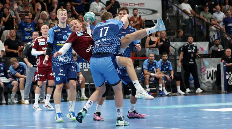 September 6, 2026, Germany, Stuttgart, Handball: TVB Stuttgart vs. Füchse Berlin; from left: Torben Matzken (TVB), Mathias Gidsel (Berlin), Samuel Röthlisberger (TVB)