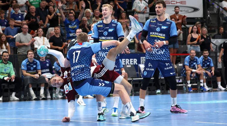 September 6, 2026, Germany, Stuttgart, Handball: TVB Stuttgart vs. Füchse Berlin; from left: Mathias Gidsel (Berlin), Samuel Röthlisberger (TVB), Torben Matzken (TVB), Philipp Meyer (Berlin)