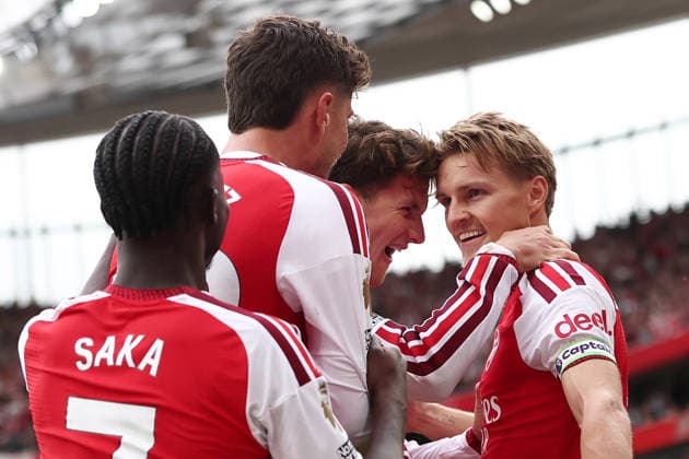 London, England, 6th September 2026. Martin Odegaard of Arsenal scoring and celebrating his sides second goal during the Arsenal vs Chelsea Premier League match at the Emirates Stadium, London. Picture credit should read: David Klein Sportimage EDITORIAL USE ONLY. No use with unauthorised audio, video, data, fixture lists, club league logos or live services. Online in-match use limited to 120 images, no video emulation. No use in betting, games or single club league player publications. SPI_051_DK_Arsenal_Chelsea SPI-4978-0051
