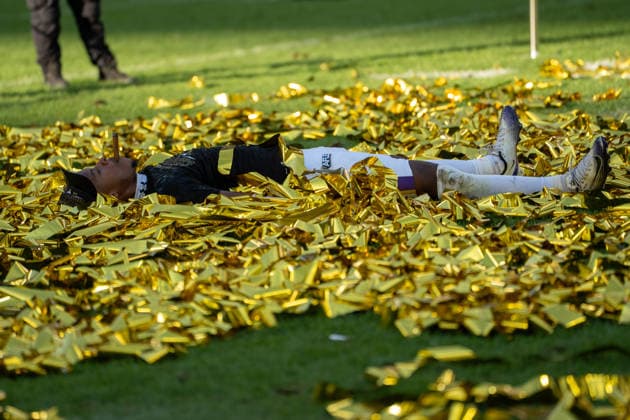 Germany, September 6, 2026, The AFLE Gold Bowl 2026: Panthers Wroclaw vs. Vienna Vikings, Schauinsland Reisen Arena, Duisburg, Germany—Vienna Vikings’ Luca Siebert amid confetti, smoking a cigar, Duisburg, Germany Copyright: xMijoxLubecx