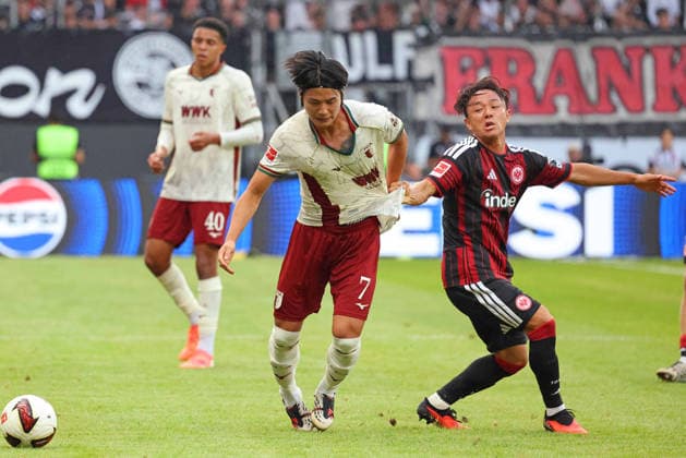 Frankfurt, Deutschland 06. September 2026: 1. BL - 2026 2027 - Sp. 2 - Eintracht Frankfurt gegen FC Augsburg Im Bild: v. li. im Zweikampf Young-woo Seol (FCA) gegen Keita Kosugi (Frankfurt). DFL DFB regulations prohibit any use of photographs as image sequences and or quasi-video Deutsche Bank Park Hessen *** Frankfurt, Germany September 6, 2026 1. Bundesliga 2026–2027 Matchday 2 Eintracht Frankfurt vs. FC Augsburg Pictured from left: Young Woo Seol (FCA) in a tackle against Keita Kosugi (Frankfurt) DFL DFB regulations prohibit any use of photographs as image sequences and or quasi-video Deutsche Bank Park, Hesse Copyright: xFotostandx xRacochax