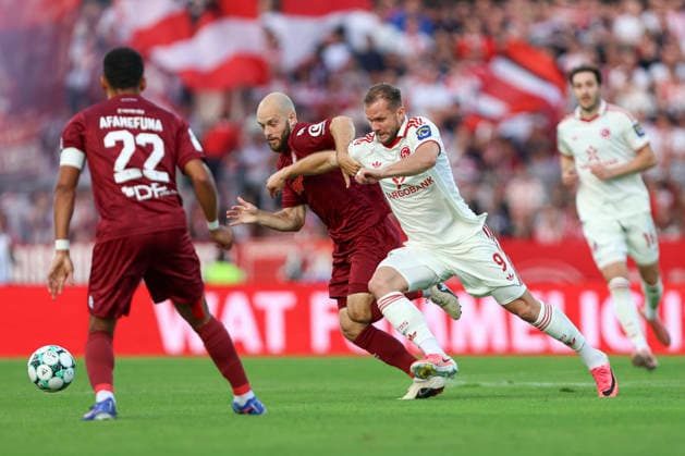 Adrian Stanilewicz of SC Fortuna Cologne and Eric Hottmann of Fortuna Düsseldorf in a tackle during the 3. Liga match between SC Fortuna Cologne and Fortuna Düsseldorf at the Südstadion on September 6, 2026, in Cologne, Germany. Photo by Oliver Kaelke, DeFodi Images. Adrian Stanilewicz of SC Fortuna Cologne and Eric Hottmann of Fortuna Düsseldorf battle for the ball during the 3. Liga match between SC Fortuna Cologne and Fortuna Düsseldorf at Südstadion on September 6, 2026 in Cologne, Germany. Photo by Oliver Kaelke, DeFodi Images. DFB and DFL regulations prohibit any use of photographs as image sequences and or quasi-video. Photo by Oliver Kaelke, DeFodi Images.