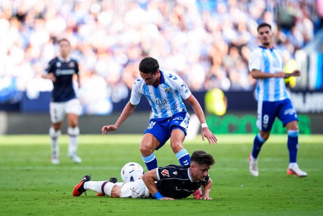 September 6, 2026, Malaga, Malaga, Spain: Carlos Dotor of Malaga CF and Ivan Romero of Levante UD in action during the Spanish league, LaLiga EA Sports, football match played between Malaga CF and Levante UD at La Rosaleda stadium on September 6, 2026, in Malaga, Spain. Malaga CF V Levante UD - LaLiga EA Sports  - ZUMAa181 20260906_zaa_a181_137 Copyright: xJoaquinxCorcherox