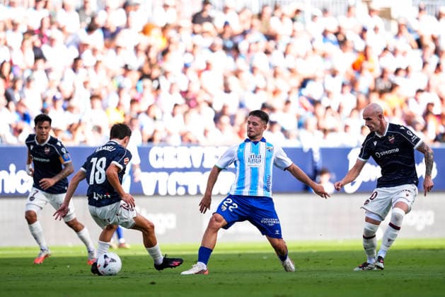 September 6, 2026, Malaga, Malaga, Spain: Dani Lorenzo of Malaga CF and Enzo Bardeli of Levante UD in action during the Spanish league, LaLiga EA Sports, football match played between Malaga CF and Levante UD at La Rosaleda stadium on September 6, 2026, in Malaga, Spain. Malaga Spain - ZUMAa181 20260906_zaa_a181_142 Copyright: xJoaquinxCorcherox