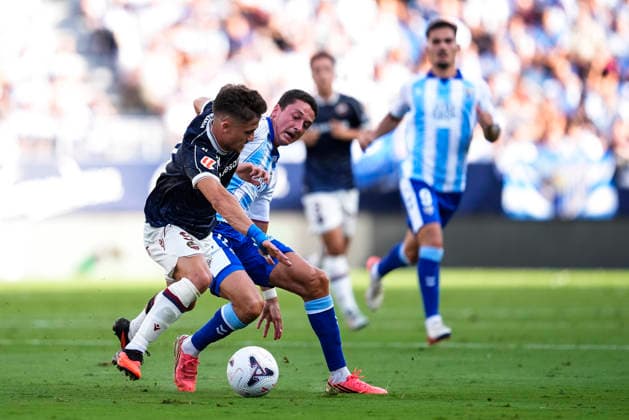 September 6, 2026, Malaga, Malaga, Spain: Carlos Dotor of Malaga CF and Ivan Romero of Levante UD in action during the Spanish league, LaLiga EA Sports, football match played between Malaga CF and Levante UD at La Rosaleda stadium on September 6, 2026, in Malaga, Spain. Malaga Spain - ZUMAa181 20260906_zaa_a181_155 Copyright: xJoaquinxCorcherox