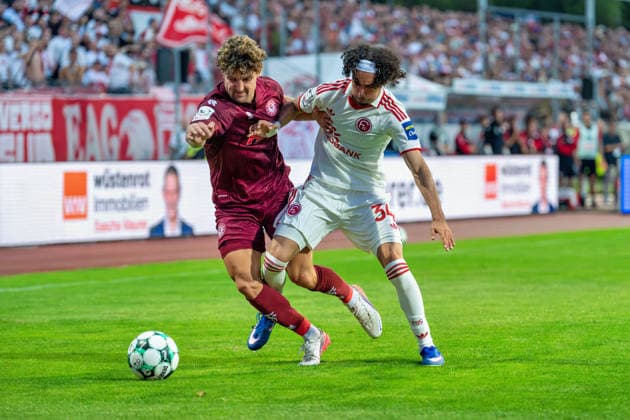 Enzo Wirtz (Fortuna Cologne), No. 9, in a tackle with Anas Slimani (Fortuna Düsseldorf), No. 34, for the ball; Fortuna Cologne vs. Fortuna Düsseldorf, soccer, 3rd Division, Matchday 4, 2026–27 season, September 6, 2026, DFL regulations prohibit any use of photographs as image sequences and or quasi-video, Fortuna Cologne vs. Fortuna Düsseldorf, soccer, 3rd Division, Matchday 4, 2026–27 season, September 6, 2026, Cologne Copyright: xEibner-Pressefoto LukasxBaldygax EP_LBA