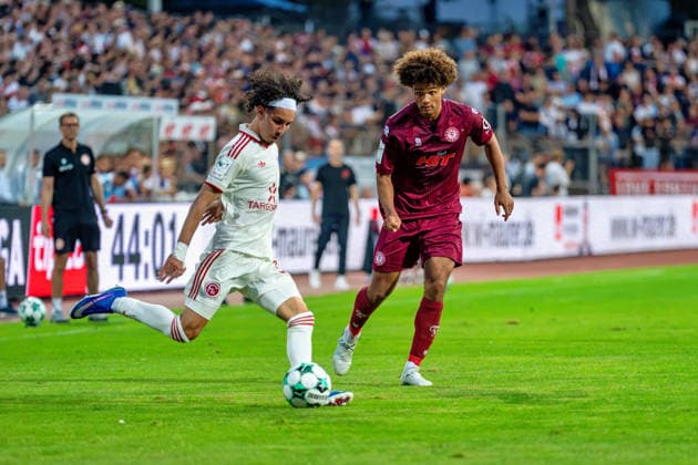 Anas Slimani (Fortuna Düsseldorf), 34, crosses in front of Neo Telle (Fortuna Cologne), 31; Fortuna Cologne vs. Fortuna Düsseldorf, Soccer, 3rd Division, Matchday 4, 2026–27 Season, September 6, 2026, DFL regulations prohibit any use of photographs as image sequences and or quasi-video. Fortuna Cologne vs. Fortuna Düsseldorf, soccer, 3rd League, Matchday 4, 2026–27 season, September 6, 2026, Cologne Copyright: xEibner-Pressefoto LukasxBaldygax EP_LBA