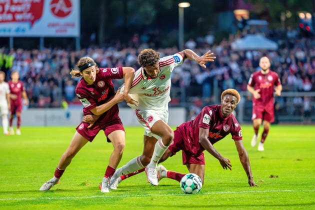 Bennit Broeger of Fortuna Cologne, 38, and Romeo Aigbekaen of Fortuna Cologne, 30, battle for the ball with Elias Egouli of Fortuna Düsseldorf, 44—Fortuna Cologne vs. Fortuna Düsseldorf, soccer, 3rd Division, Matchday 4, 2026–27 season, June 9, 2026, DFL regulations prohibit any use of photographs as image sequences and or quasi-video. Fortuna Cologne vs. Fortuna Düsseldorf, soccer, 3. Liga, Matchday 4, 2026–27 season, September 6, 2026, Cologne Copyright: xEibner-Pressefoto LukasxBaldygax EP_LBA