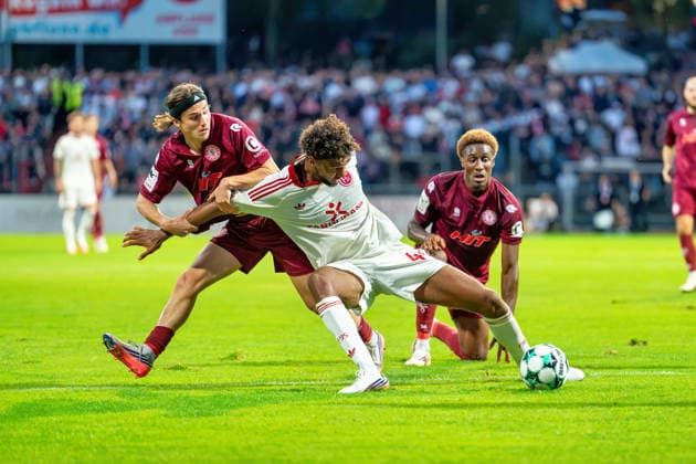 Bennit Broeger of Fortuna Cologne, 38, and Romeo Aigbekaen of Fortuna Cologne, 30, battle for the ball with Elias Egouli of Fortuna Düsseldorf, 44—Fortuna Cologne vs. Fortuna Düsseldorf, soccer, 3rd Division, Matchday 4, 2026–27 season, June 9, 2026, DFL regulations prohibit any use of photographs as image sequences and or quasi-video. Fortuna Cologne vs. Fortuna Düsseldorf, soccer, 3. Liga, Matchday 4, 2026–27 season, September 6, 2026, Cologne Copyright: xEibner-Pressefoto LukasxBaldygax EP_LBA