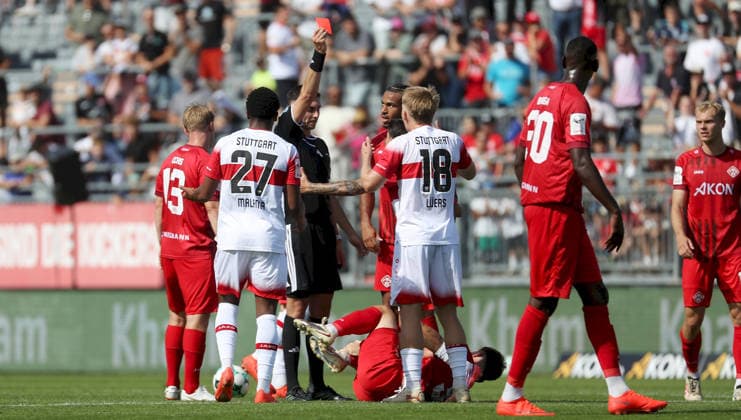 September 6, 2026, xfsx, Men s, Soccer, 2026–2027 Season, 3rd Division, Matchday 4: FC Würzburger Kickers vs. VfB Stuttgart II; from left: Philipp Ochs (FC Würzburger Kickers), Jarzinho Malanga (VfB Stuttgart II); Referee Timon Schulz shows Julian Lueers (VfB Stuttgart II) a red card—dismissal, sending off; Tim Kraus (FC Würzburger Kickers) in pain after a foul, racked with pain; David Abrangao (FC Würzburger Kickers), Tarsis Bonga (FC Würzburger Kickers), Louis Breunig (FC Würzburger Kickers); Wurzburg, AKON ARENA, Bavaria, Germany