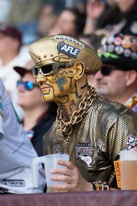 Germany, September 6, 2026, The AFLE Gold Bowl 2026: Panthers Wroclaw vs. Vienna Vikings, Schauinsland Reisen Arena, Duisburg. A Rhein Fire fan wearing face paint in the stands in Duisburg, Germany. Copyright: xMijoxLubecx