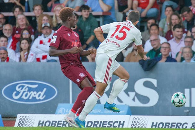 September 6, 2026, xsefx, Soccer, SC Fortuna Cologne vs. Fortuna Düsseldorf, 3rd Division, Südstation, Matchday 4, 2026–2027 Season: Romeo Aigbekaen (Fortuna Cologne, No. 30) in a tackle against Tim Oberdorf (Fortuna Düsseldorf, No. 15). DFB regulations prohibit any use of photographs as image sequences and or quasi-video. North Rhine-Westphalia, Germany