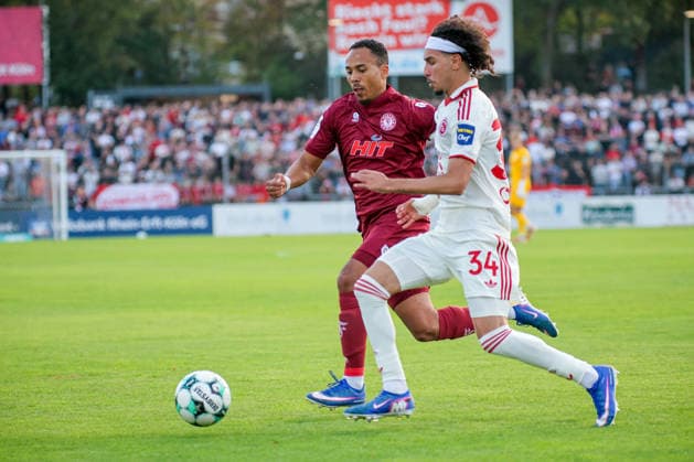 September 6, 2026, xsefx, Soccer, SC Fortuna Cologne vs. Fortuna Düsseldorf, 3. Liga, Südstation, Matchday 4, 2026–2027 Season: Robin Afamefuna (Fortuna Cologne, No. 22) in a tackle against Anas Slimani (Fortuna Düsseldorf, No. 34). DFB regulations prohibit any use of photographs as image sequences and or quasi-video. North Rhine-Westphalia, Germany