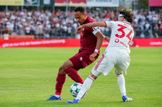September 6, 2026, xsefx, Soccer, SC Fortuna Cologne vs. Fortuna Düsseldorf, 3. Liga, Südstation, Matchday 4, 2026–2027 Season: Robin Afamefuna (Fortuna Cologne, No. 22) in a tackle against Anas Slimani (Fortuna Düsseldorf, No. 34). DFB regulations prohibit any use of photographs as image sequences and or quasi-video. North Rhine-Westphalia, Germany