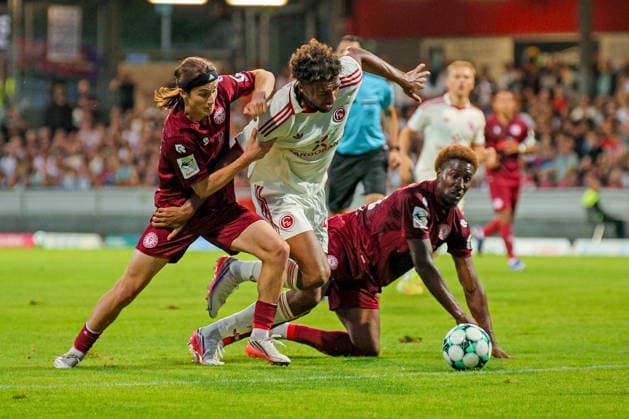 September 6, 2026, xsefx, Soccer, SC Fortuna Cologne vs. Fortuna Düsseldorf, 3rd Division, Südstation, Matchday 4, 2026–2027 season: Bennit Bröger (Fortuna Cologne, No. 38) in a tackle against Elias Egouli (Fortuna Düsseldorf, No. 44). DFB regulations prohibit any use of photographs as image sequences and or quasi-video. North Rhine-Westphalia, Germany