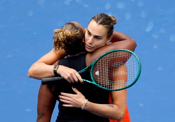 Aryna Sabalenka of Belarus hugs Taylor Townsend at net after defeating her in straight sets in Arthur Ashe Stadium in the 4th round at the 2026 US Open Tennis Championship at the USTA Billie Jean King National Tennis Center in New York City on Sunday, September 6, 2026.  NYP20260906107 JOHNxANGELILLO
