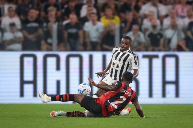 Juventus v AC Milan - Serie A - Season 2026-2027 Italy, 6th September 2026. Pervis Estupinan of AC Milan makes a strong challenge on Pierre Kalulu of Juventus during the Juventus vs AC Milan Serie A match at Allianz Stadium, Turin. Picture credit should read: Jonathan Moscrop Turin Allianz Stadium Italy