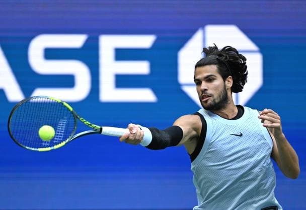 (260907) -- NEW YORK, Sept. 7, 2026 -- Carlos Alcaraz of Spain hits a return during the men s singles fourth round match between Carlos Alcaraz of Spain and Tommy Paul of the United States, at the 2026 US Open tennis championships in New York, the United States, Sept. 6, 2026. ) (SP)U.S.-NEW YORK-TENNIS-US OPEN-MEN S SINGLES LixRui 