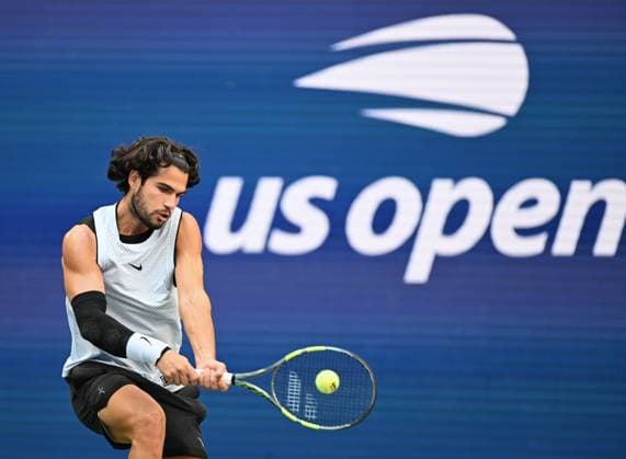 (260907) -- NEW YORK, Sept. 7, 2026 -- Carlos Alcaraz of Spain hits a return during the men s singles fourth round match between Carlos Alcaraz of Spain and Tommy Paul of the United States, at the 2026 US Open tennis championships in New York, the United States, Sept. 6, 2026. ) (SP)U.S.-NEW YORK-TENNIS-US OPEN-MEN S SINGLES LixRui 