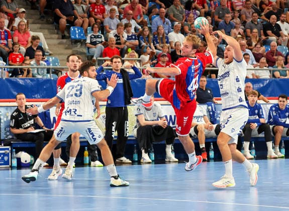 September 6, 2026, Germany, Bietigheim, Handball Bundesliga, 2026–2027 season: SG BBM Bietigheim vs. TBV Lemgo; from left: Tim Suton (TBV), Mathias Larson (BBM), Christian O Sullivan (TBV)