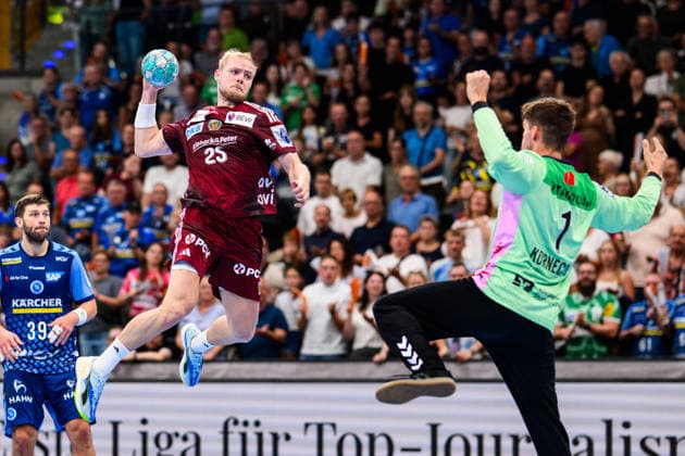 TVB Stuttgart vs. Füchse Berlin, Handball 1 Bundesliga, Men s, 2026–2027 Season, TVB Stuttgart vs. Füchse Berlin, Porsche Arena: Berlin s Matthes Langhoff in action against Stuttgart s goalkeeper Mateusz Kornecki, Stuttgart, Porsche Arena, Baden-Württemberg, Germany