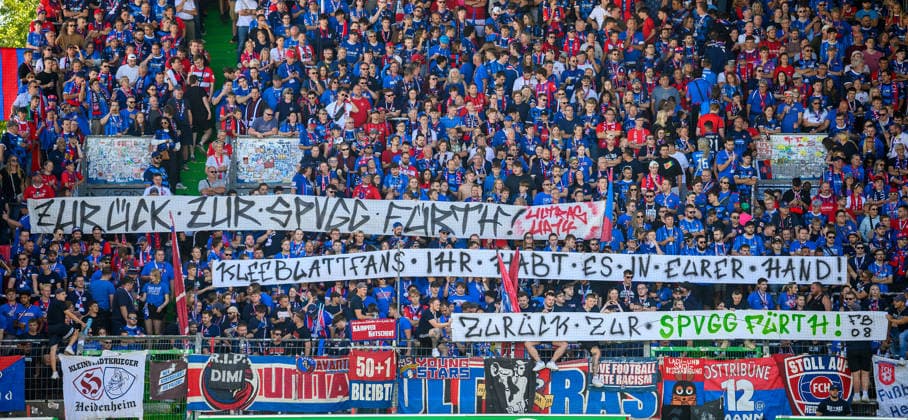 September 6, 2026 Soccer Season 2026–2027, Bundesliga 2, Matchday 4: SpVgg Greuther Fürth Kleeblatt vs. FC Heidenheim Sports photo by Zink xwoxzix. DFL regulations prohibit any use of photographs as image sequences and or quasi-video; for editorial use only. Banner: Campaign support. BACK TO SPVGG FÜRTH. Fans. Fan block. FCH