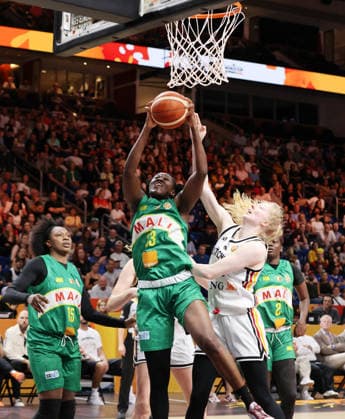 Naignouma Coulibaly, Sika Kone with the ball, Frieda Bühner in a matchup—game action, basketball, FIBA World Cup, Women s World Championship, 2026–2027 season, July 9, 2026, DBB, Germany (GER) vs. Mali