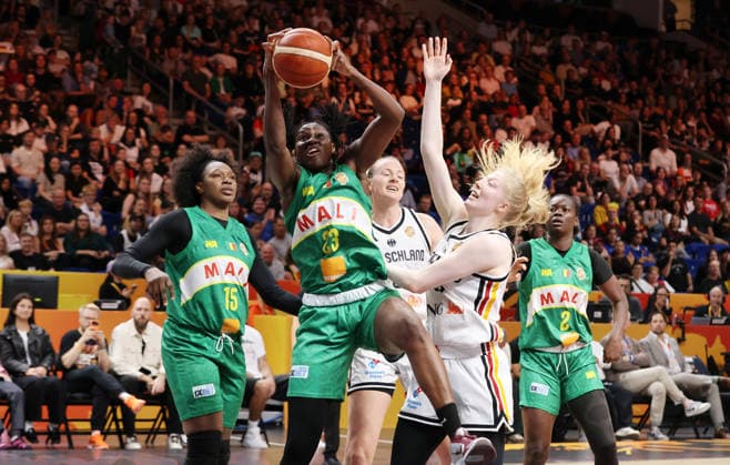Naignouma Coulibaly, Sika Kone with the ball, Frieda Bühner in a matchup—game action, basketball, FIBA World Cup, Women s World Championship, 2026–2027 season, July 9, 2026, DBB, Germany (GER) vs. Mali